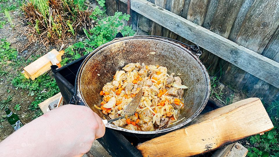 Cooking food on the campfire