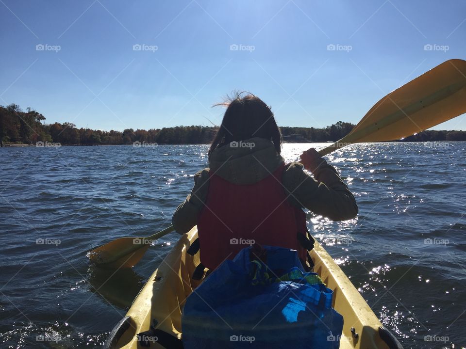 Paddle Away. My friend learning how to paddle in a kayak 