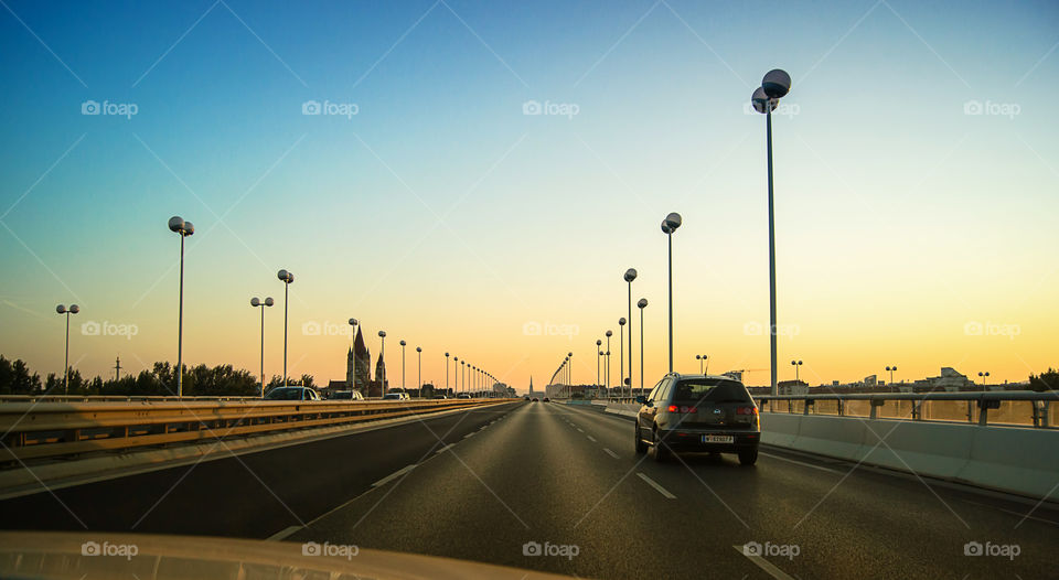 Driving over Bridge. driving over bridge at sunset
