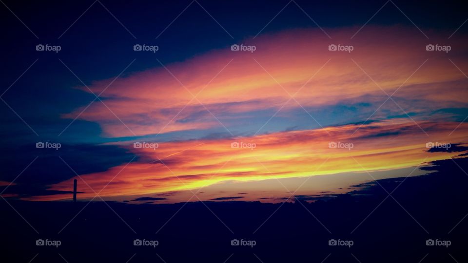 Golden Sunset. Taking one of my walks and I notice how beautiful the sunset is.