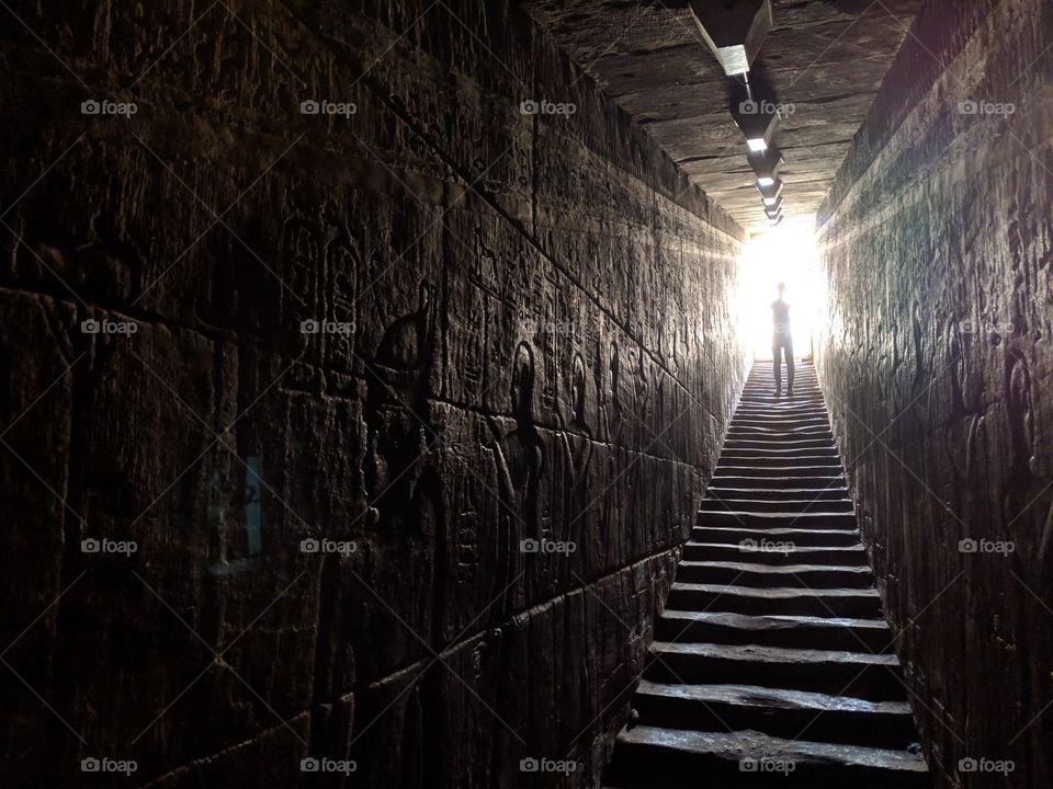 exploring the steps in Edfu Temple in Egypt.