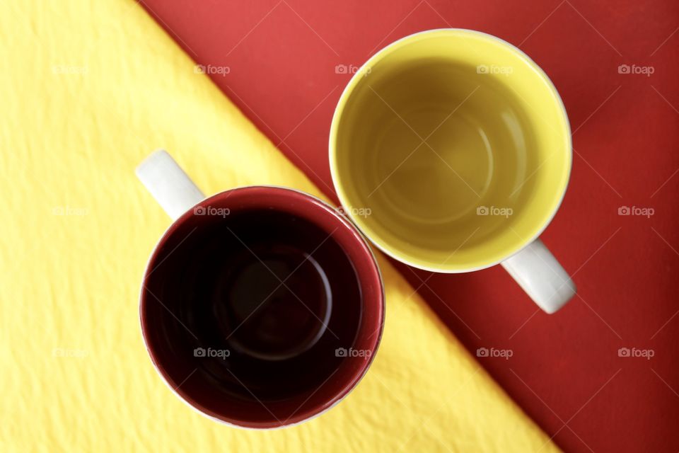 Red and yellow mugs from above