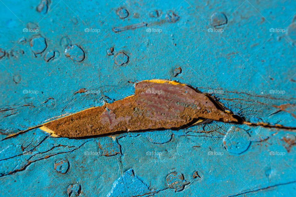 rusted metal on blue color