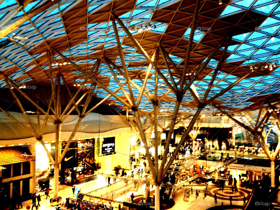 west london westfield shopping centre night time glass roof panels by kikicheeky