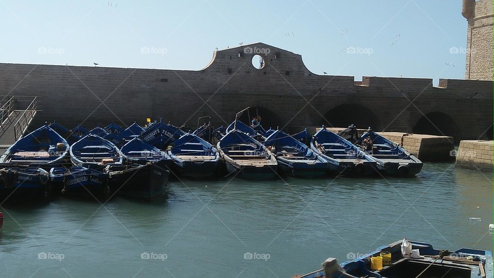 small boats on the seaport.