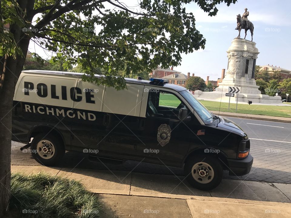 Robert E. Lee Statue Richmond with Police van. 
