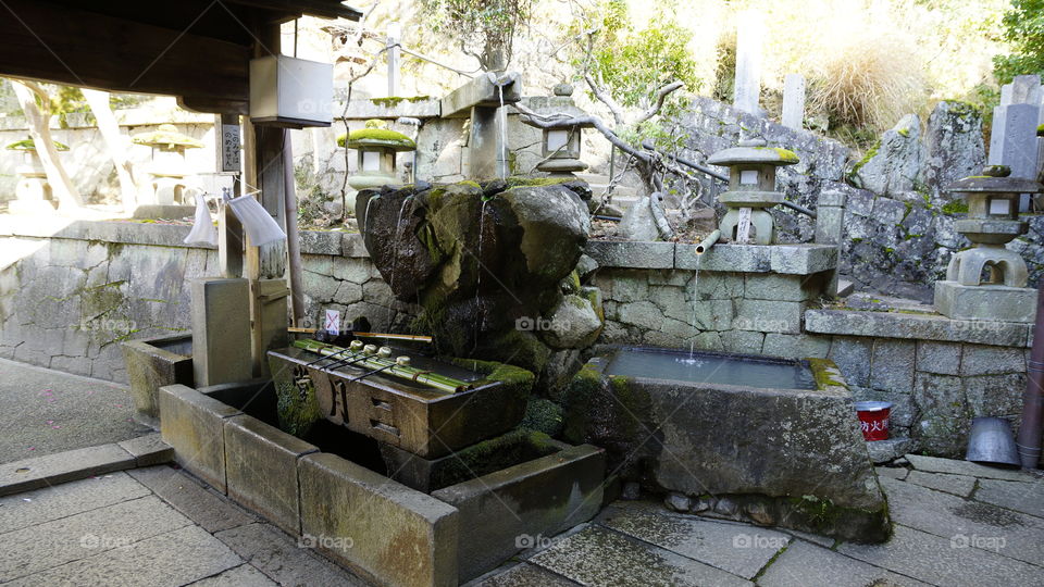 hand washing for purification before approaching shrines or temples