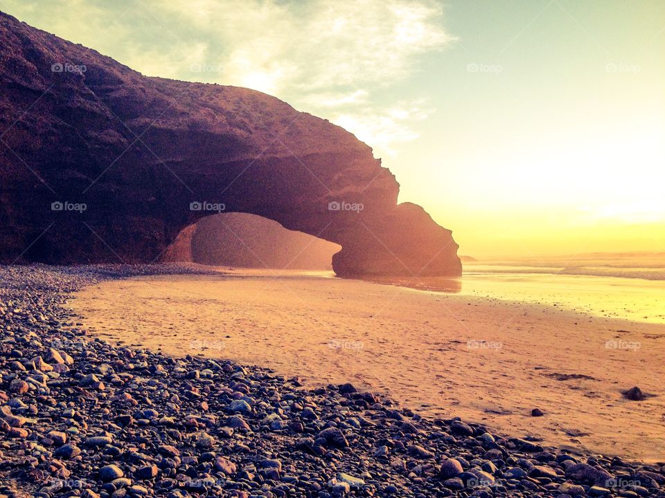 Arcs of Legzira. Stone arcs on Legzira beach in Morocco