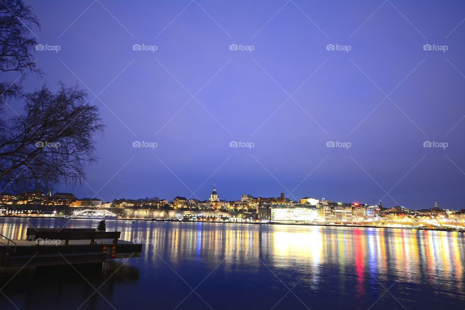 Glowing Södermalm by night seen from Skeppsholmen 