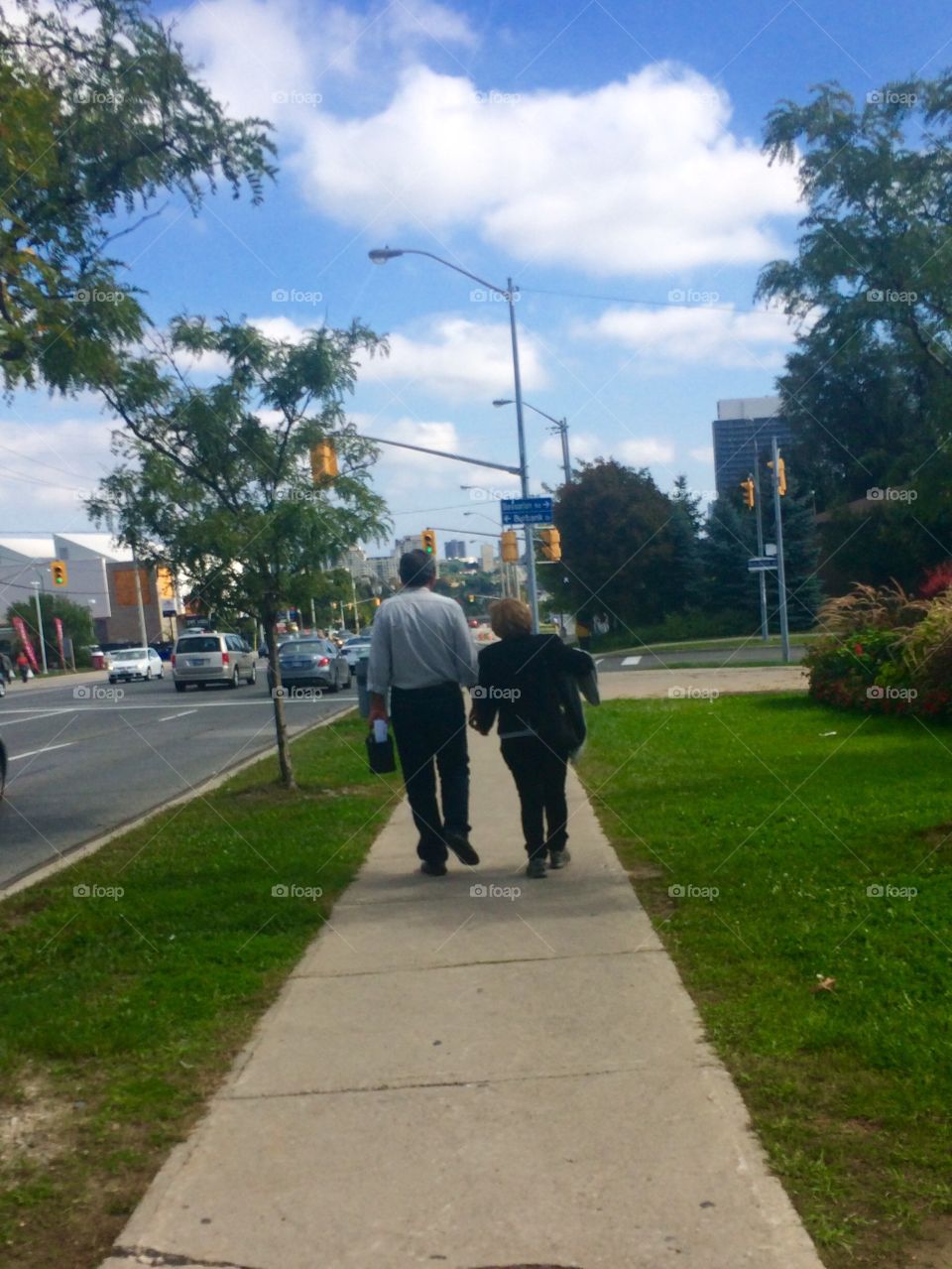 Senior couple enjoy walking together !