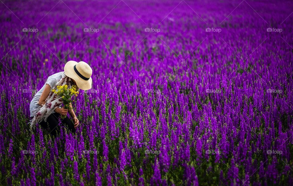 Purple flowers and woman