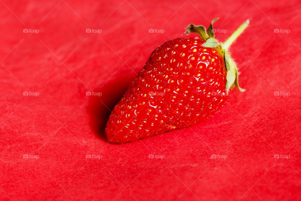 Strawberry on a red background 