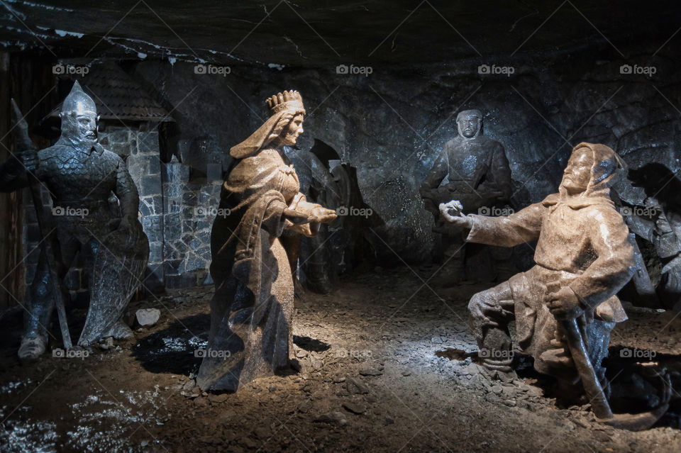 Real size salt sculptures depicting the tale of Saint Kinga and her ring. Founder of Wieliczka Salt Mine.  Carved from solid rocks of salt by skilled miners centuries ago in the tunnels of salt mine. Mine is still producing salt. Poland. Europe
