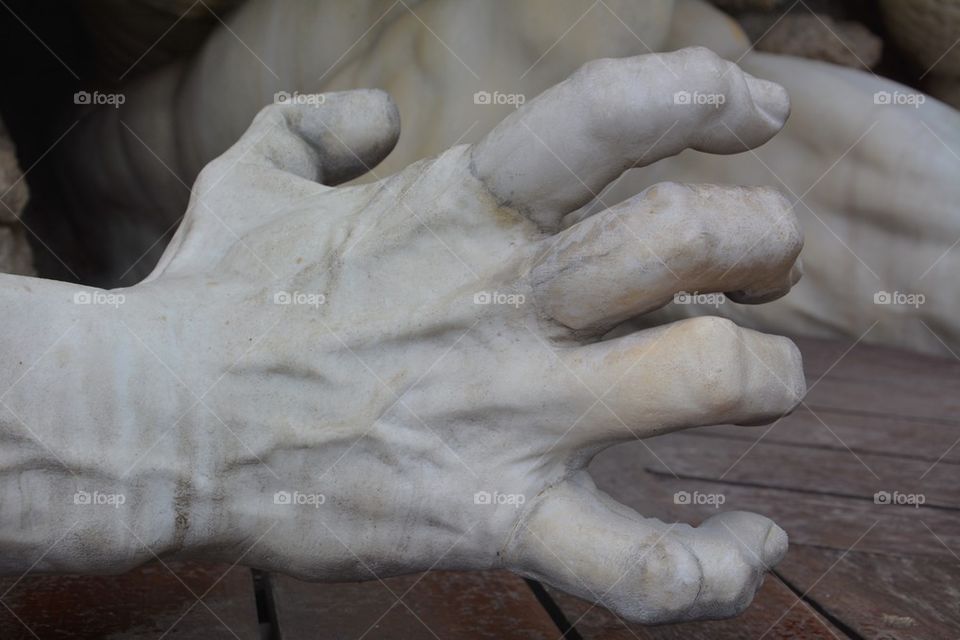 Marble hand detail of a monument front of the Hofburg Palace, Vienna, Austria