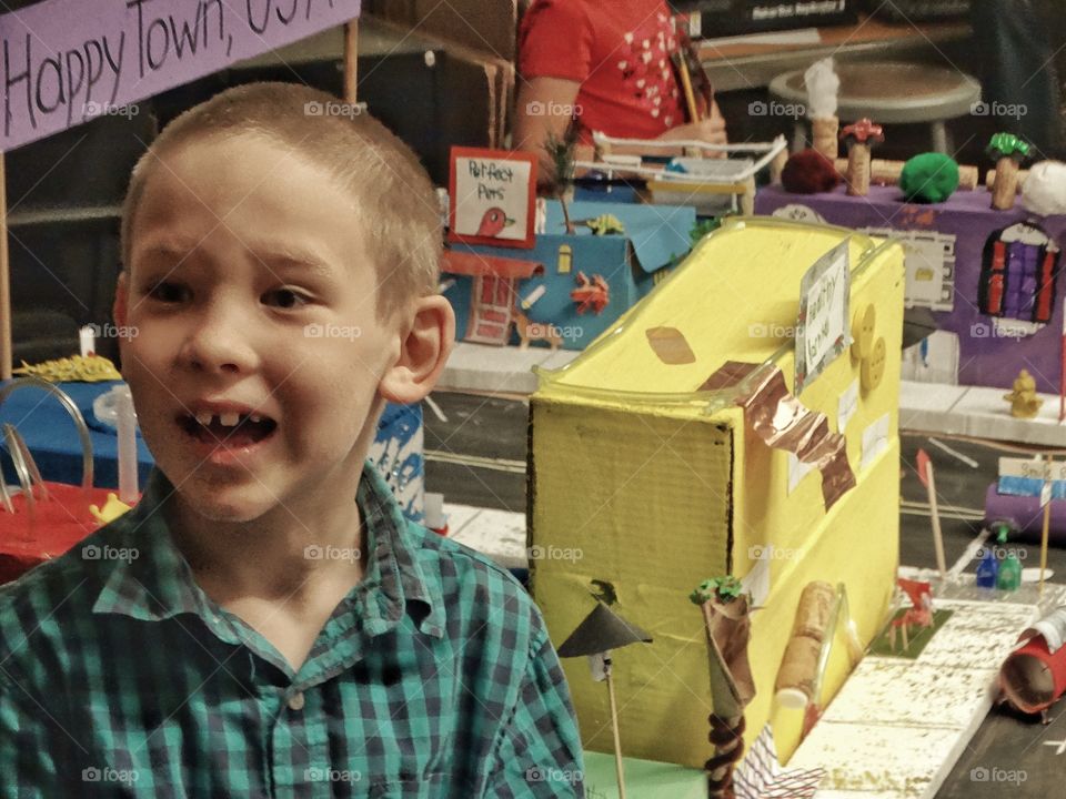 Boy With School Art Project
