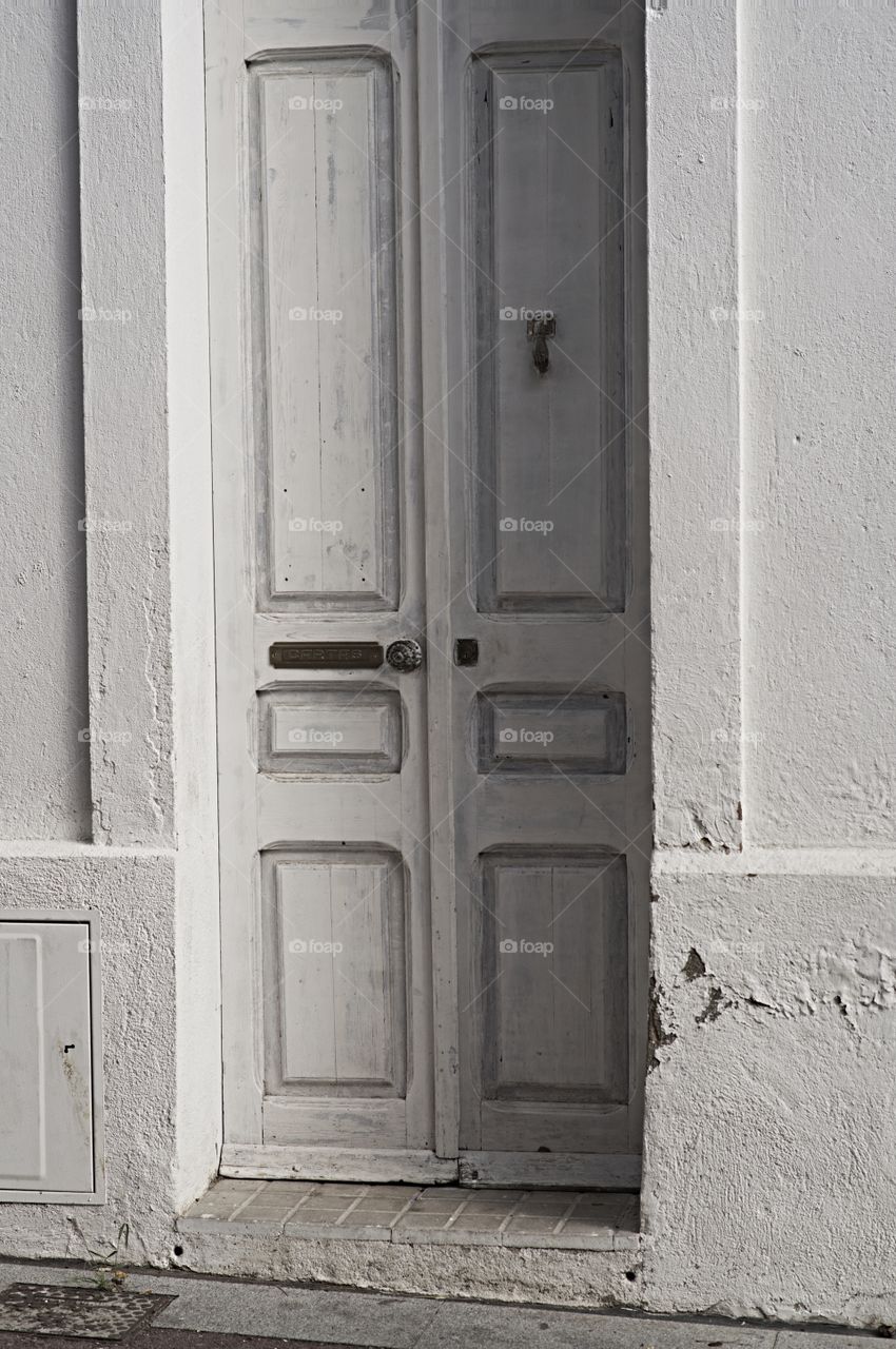 Close-up of white door