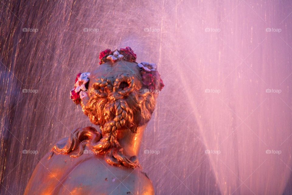 statue of a person in a garden