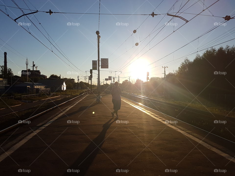 Sun on railroad 