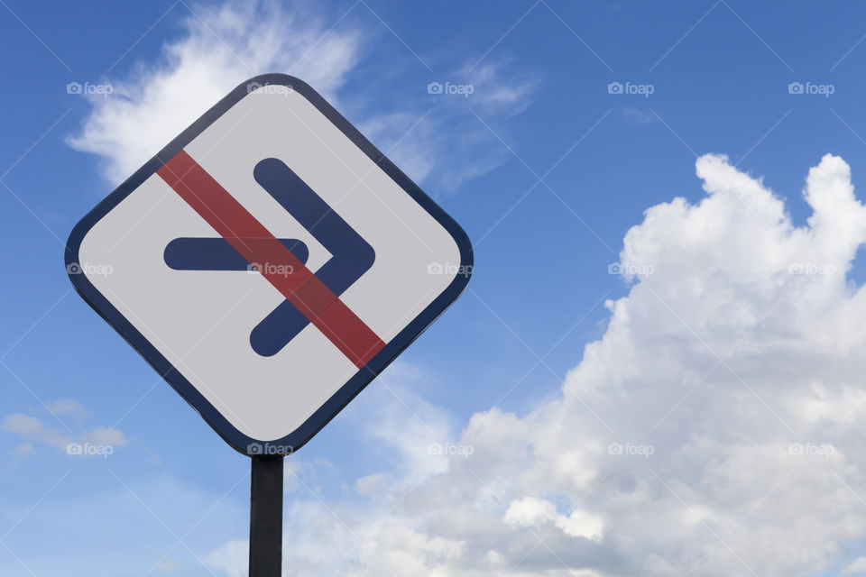 No turn right traffic sign on bright blue sky background
