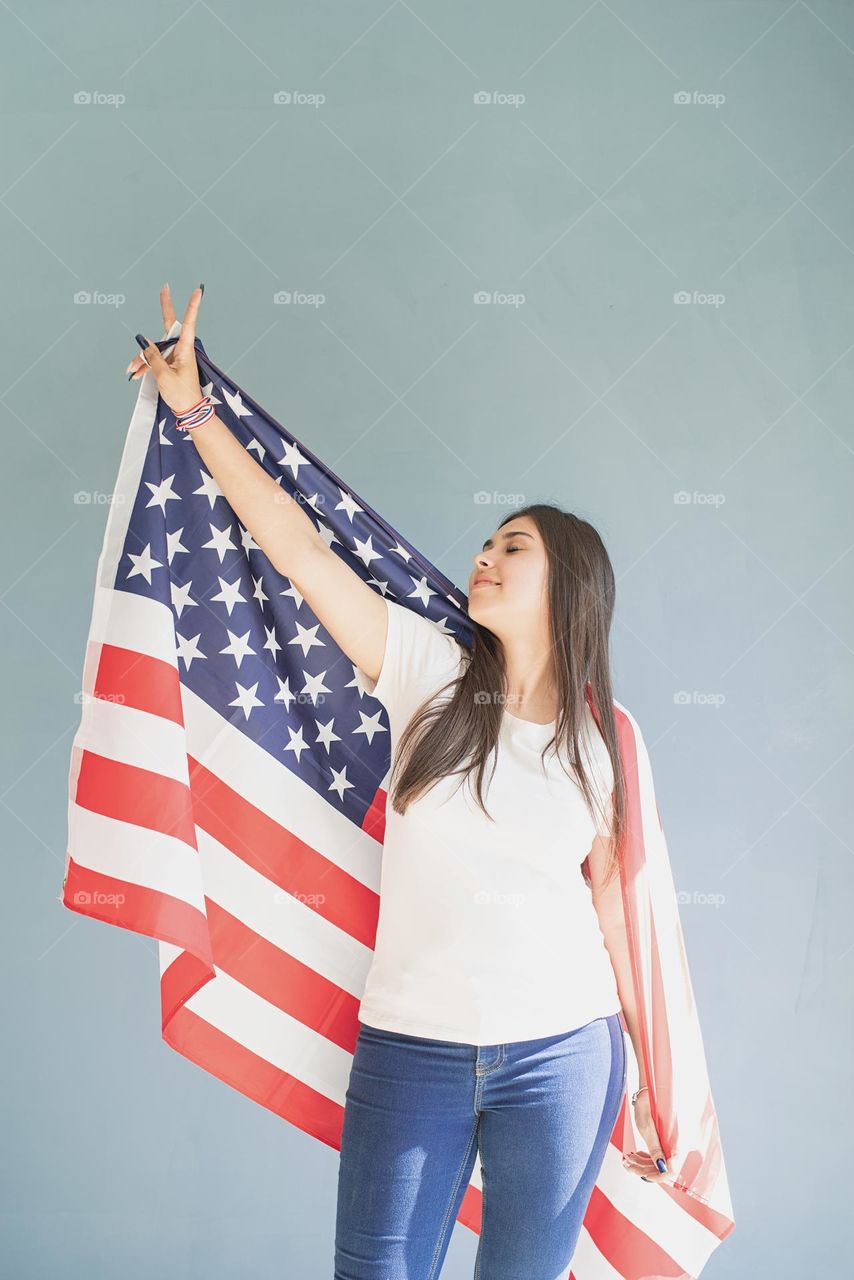 woman holding USA flag