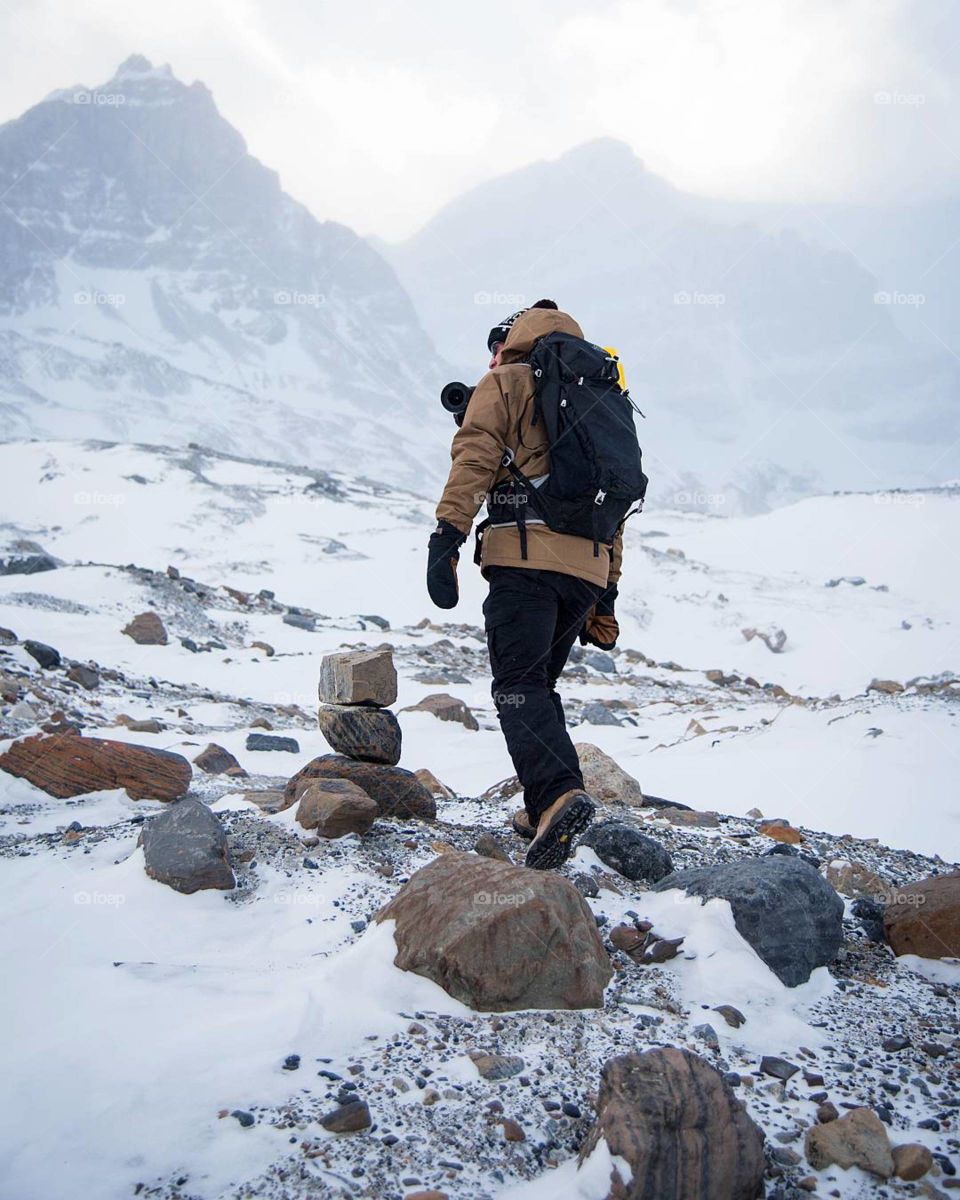 hiking the Canadian mountains during winter.