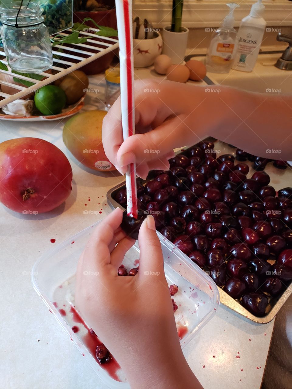 easy cherry pitting using a straw