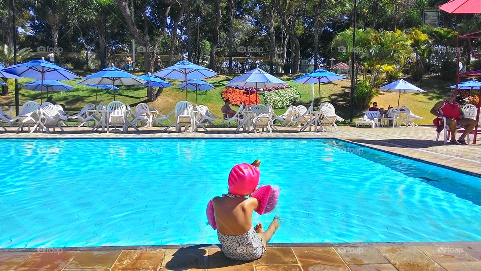 Girl dressed for swimming in the pool