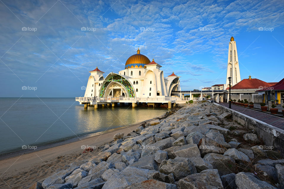 Straits Mosque, Malacca on the blue sky back