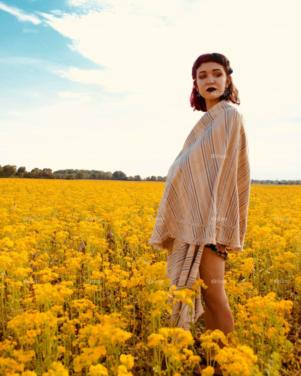 girl in a yellow field 2