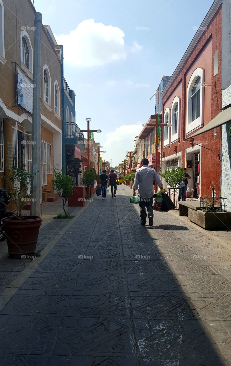 shopping in a town in Jalisco, Mex. among old colorful buildings