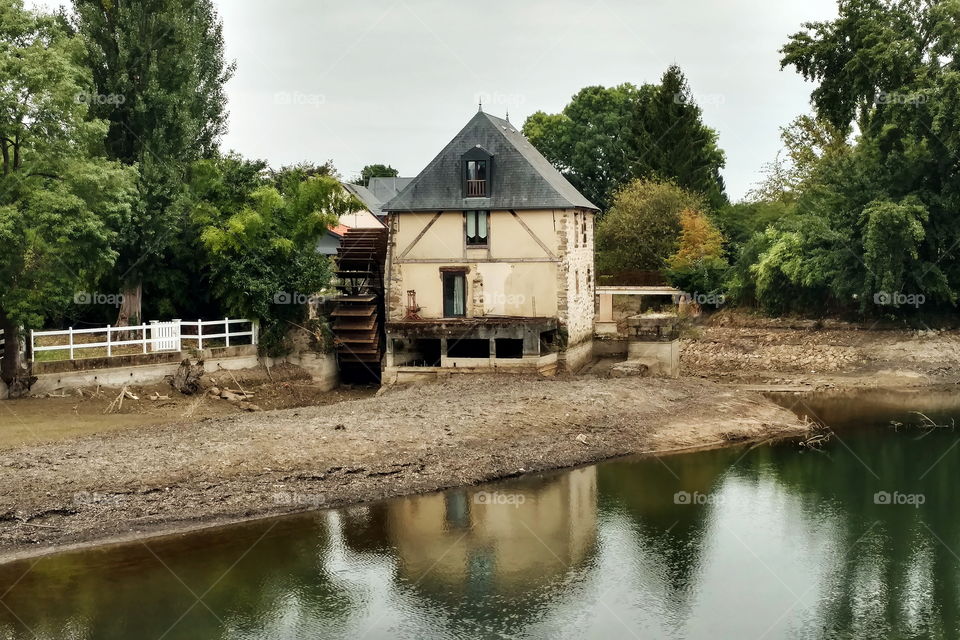 An old mill on the bank o