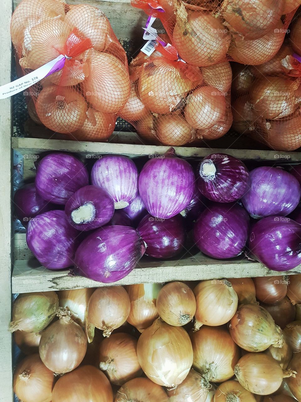 onion varieties market stall fresh fruit and vegetables colours