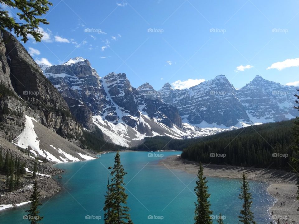 Awe-Inspiring Serenity: Gazing upon Lake Agnes under Blue skies 