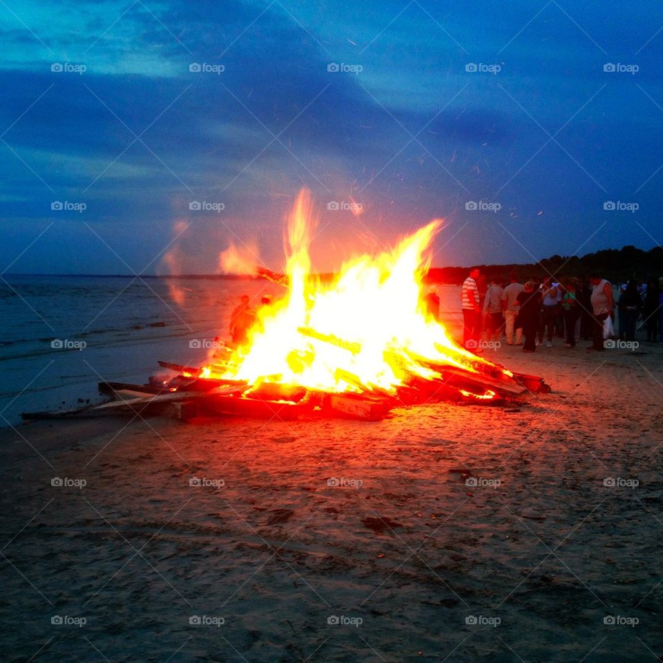 sky beach twilight bonfire by omiata