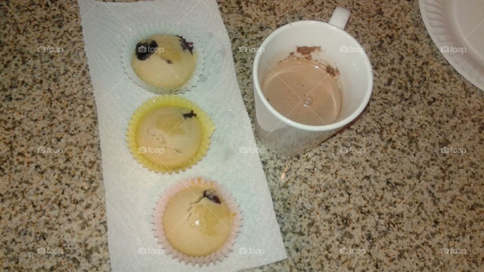 Homemade blueberry muffins and store bought hot cocoa.