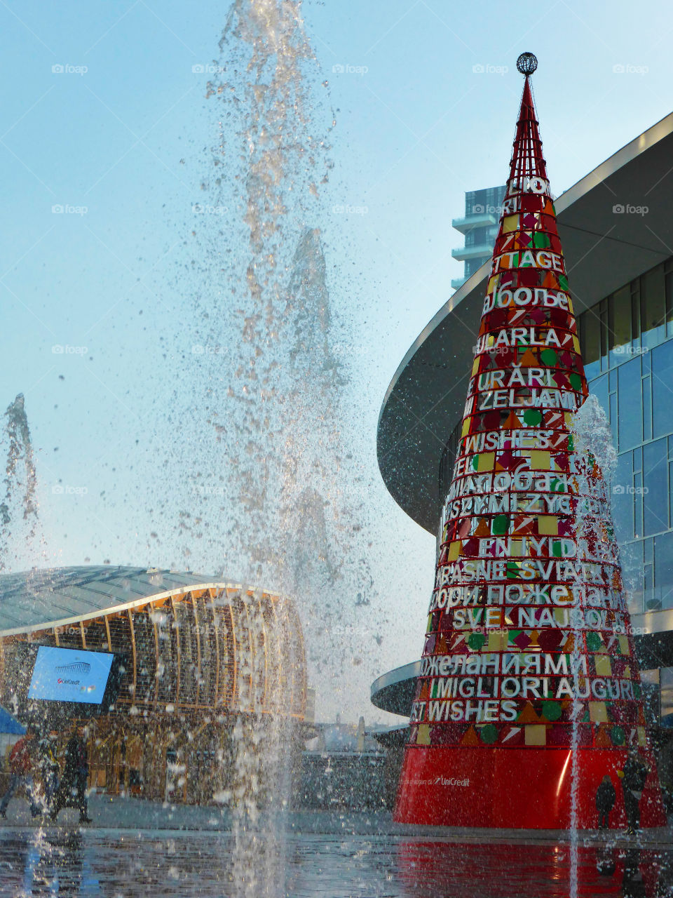 Fountain and christmans tree in a modern contest,Milan,Italy