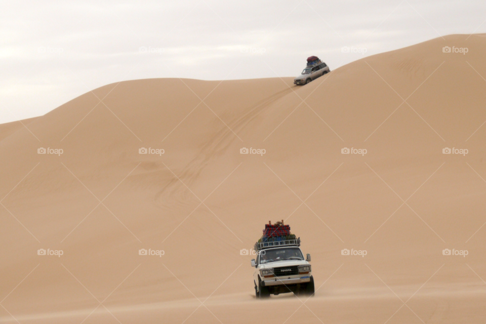 great sand sea. libyan desert. egypt. sand dune desert safari toyota land cruiser by ann