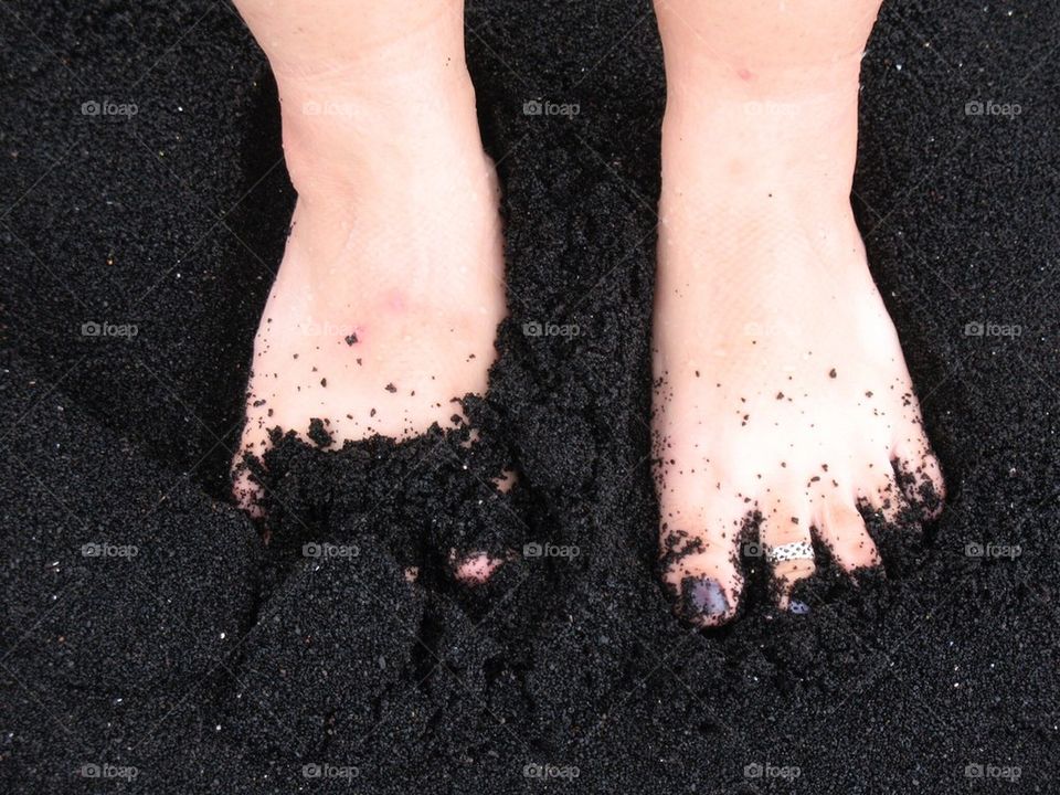Black sand feet