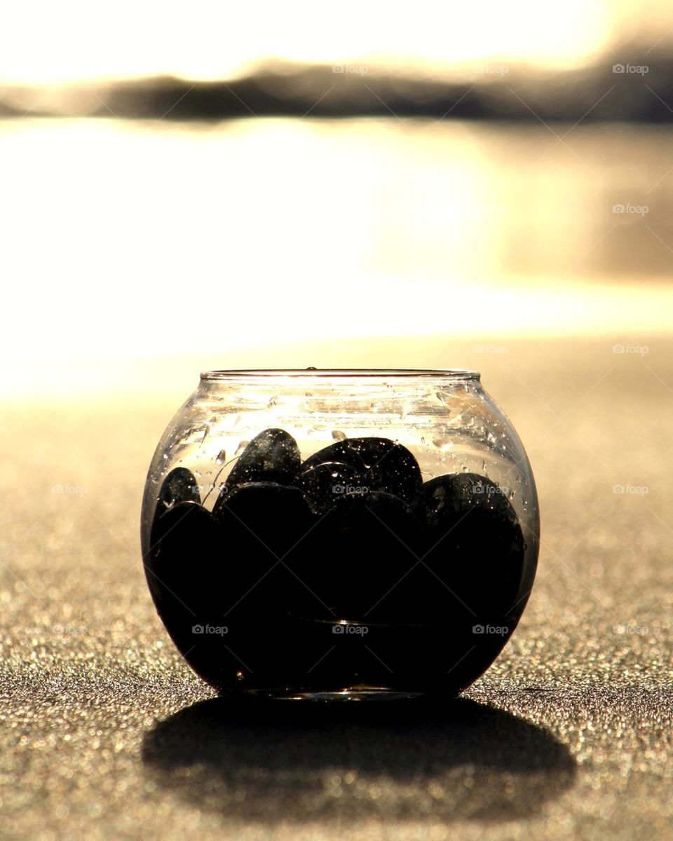 Glass full of rocks