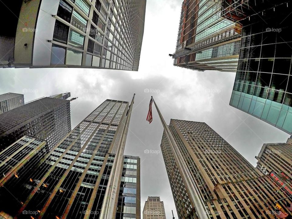 Skyscrapers in New York City. Looking upwards perspective.