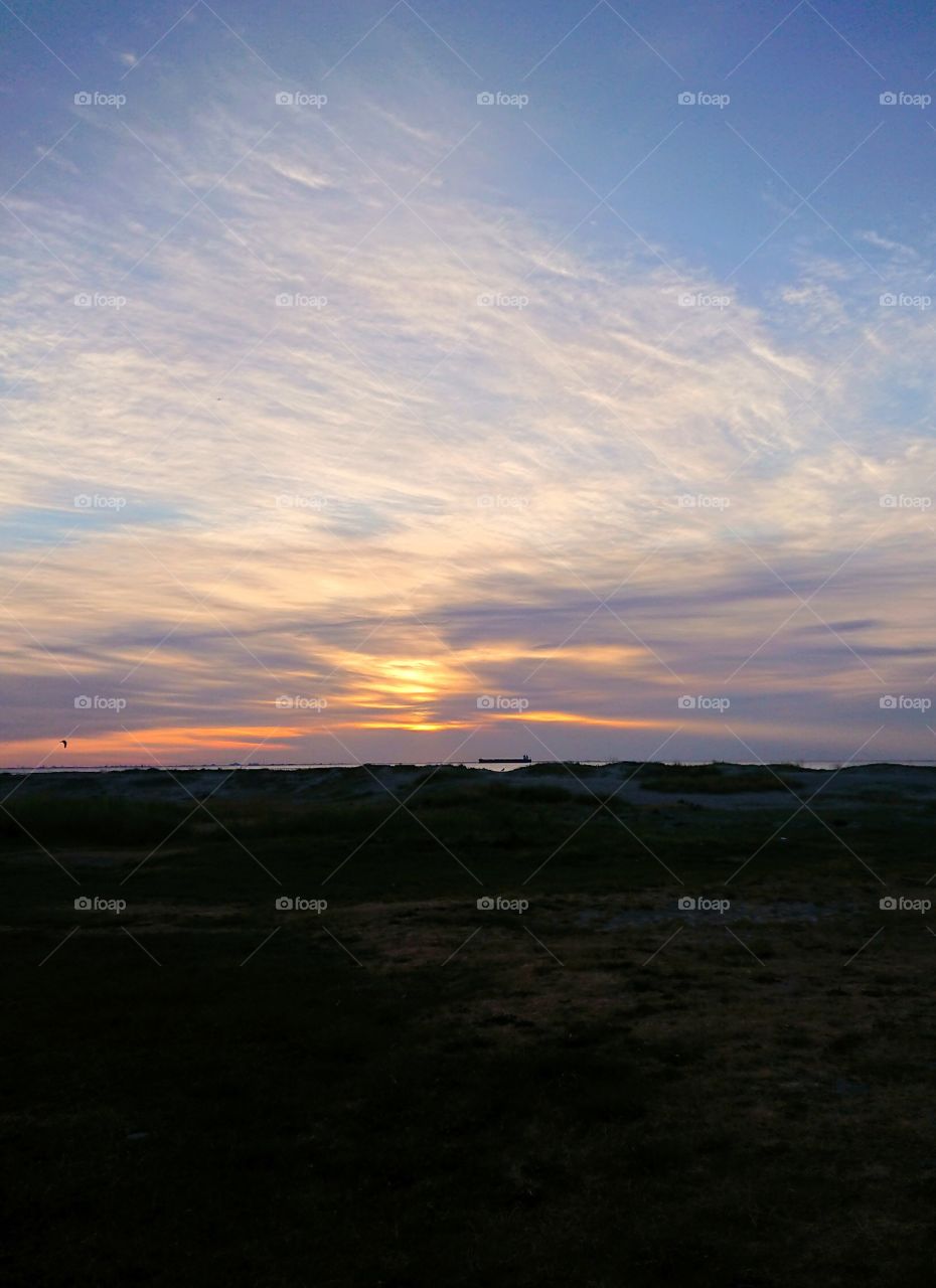 Sunset over oresund, border between Sweden and Denmark