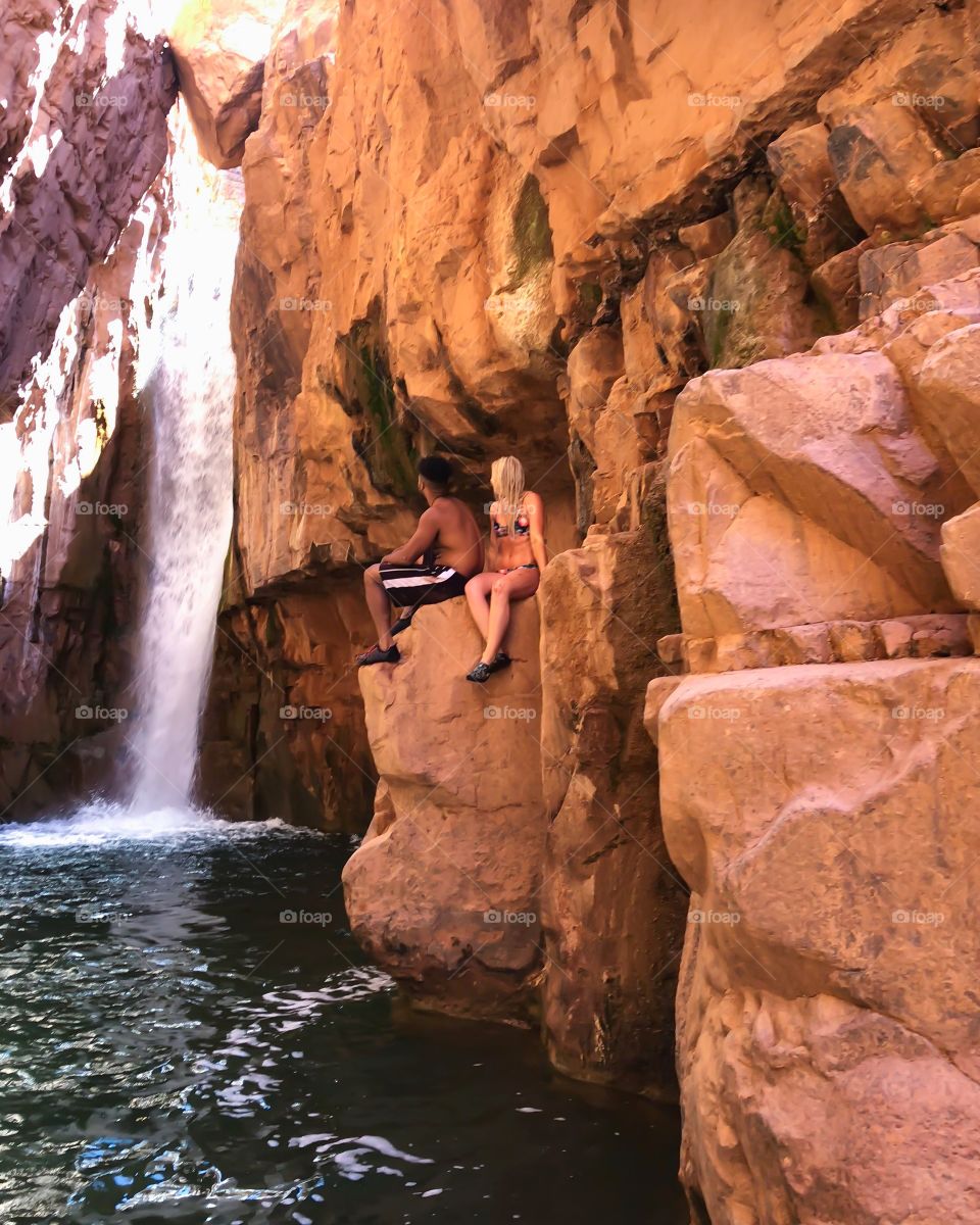 Watching the beautiful waterfall at Cibecue Falls, Arizona.