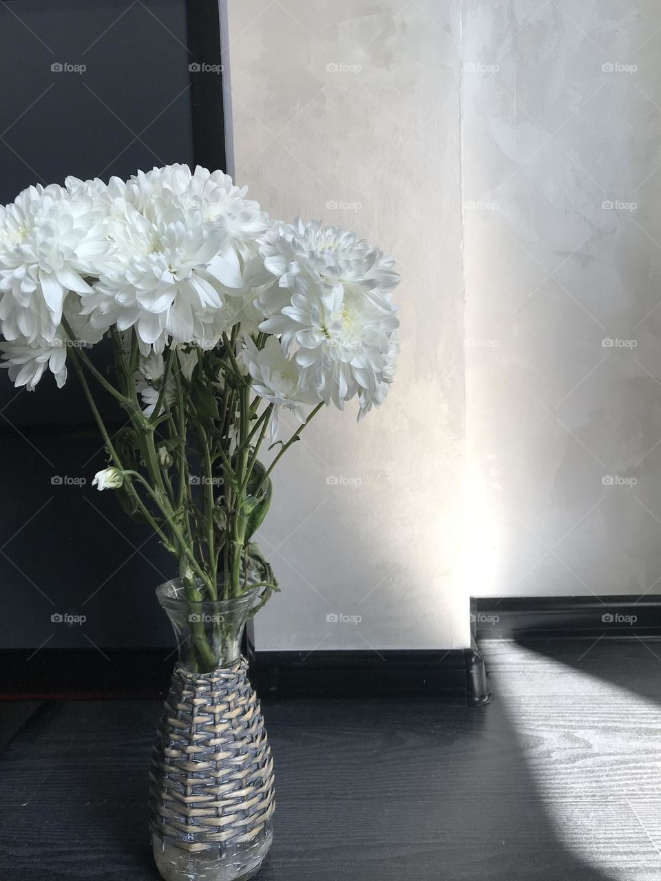 White beautiful flowers in vase at home