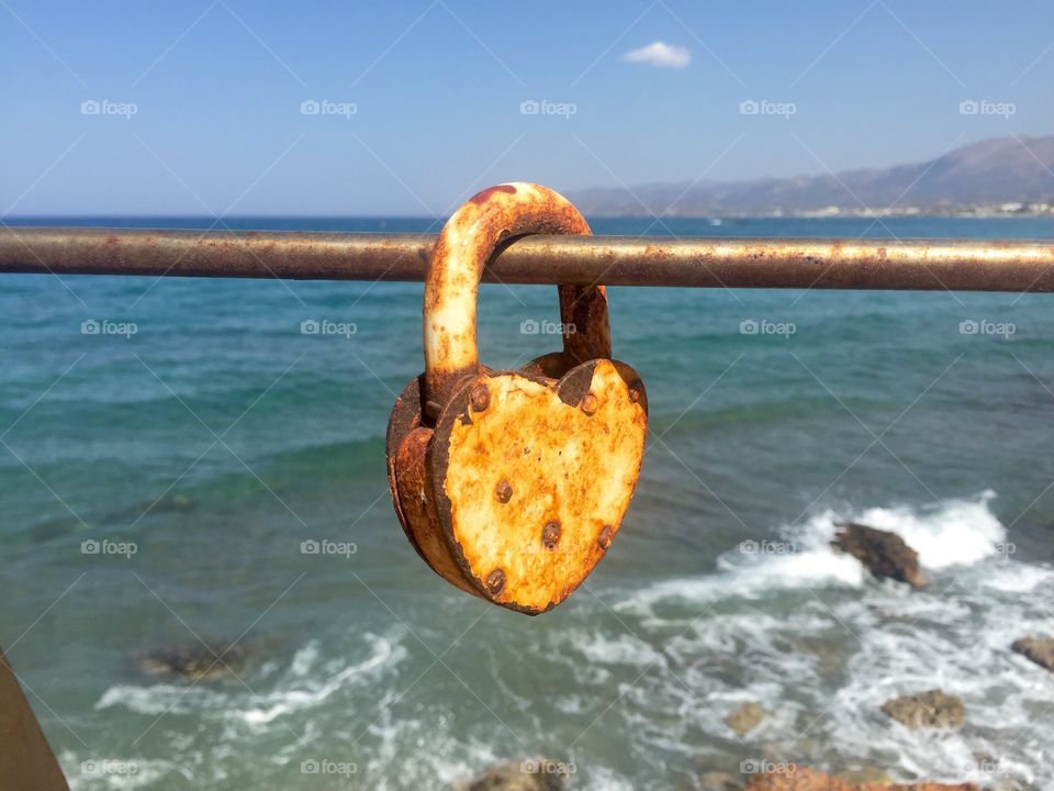 Single heart shaped locker with view of the sea in the background