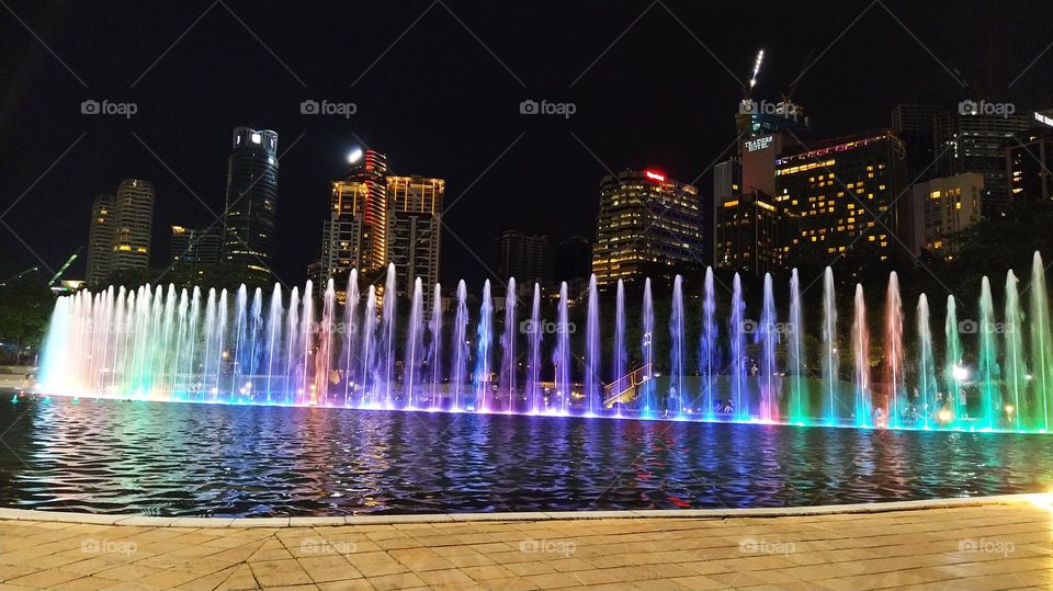 Artificial lake at night in KLCC Malaysia