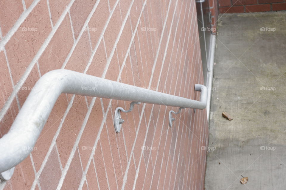 brick wall and railing
