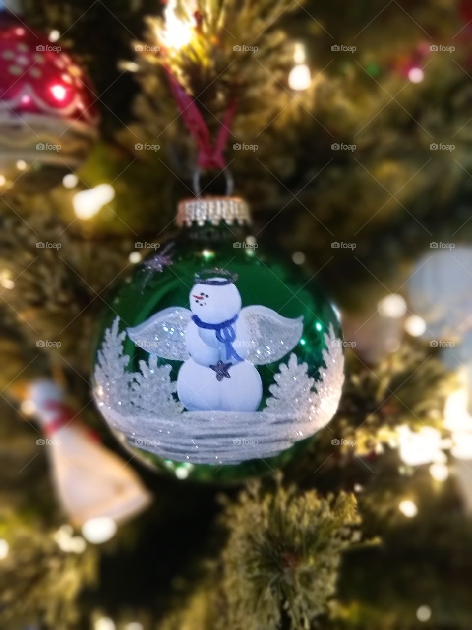 snowman angel globe ornament