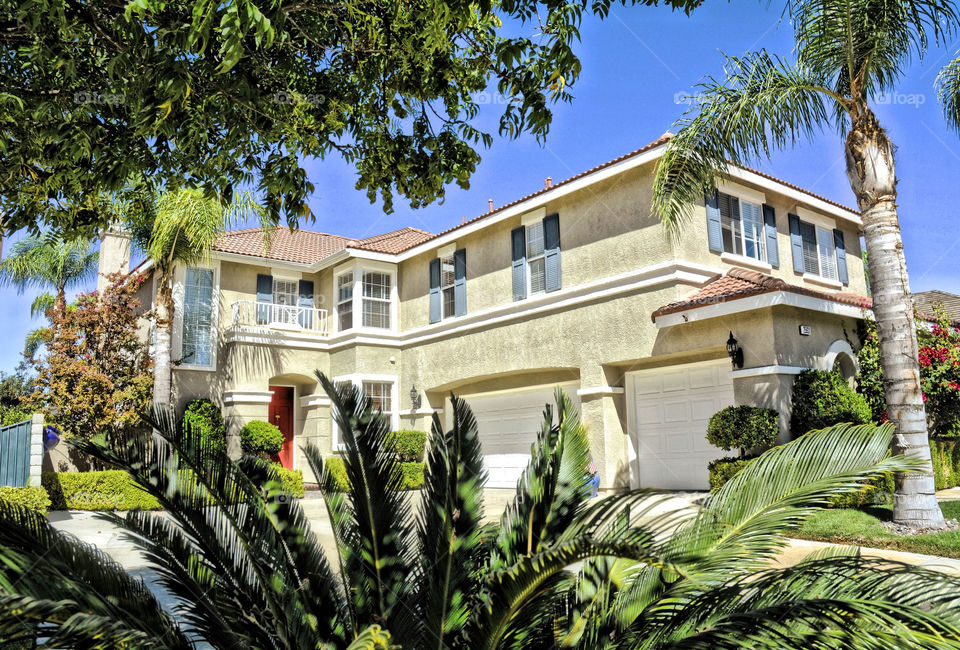 HDR image of a large luxury executive home.