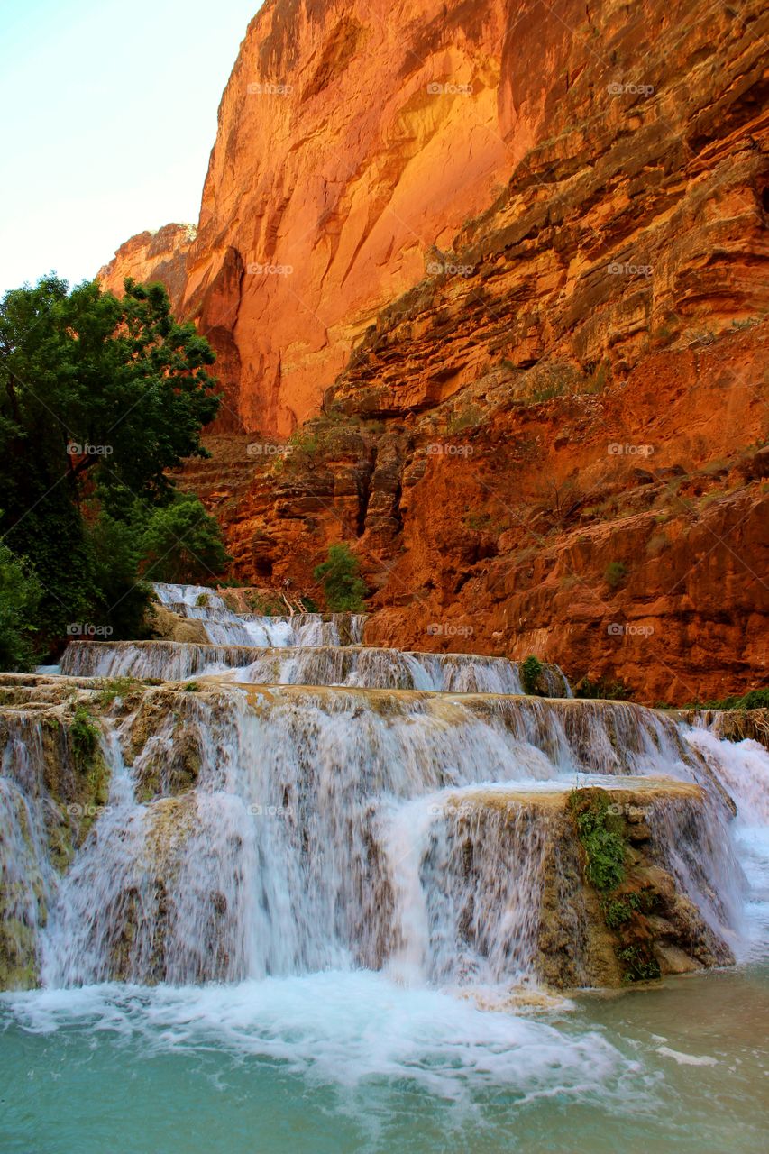 Scenic view of waterfall at rocky mountain