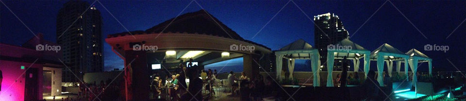 Rooftop Panorama . This is a panorama of a rooftop bar in downtown St. Petersburg Florida.